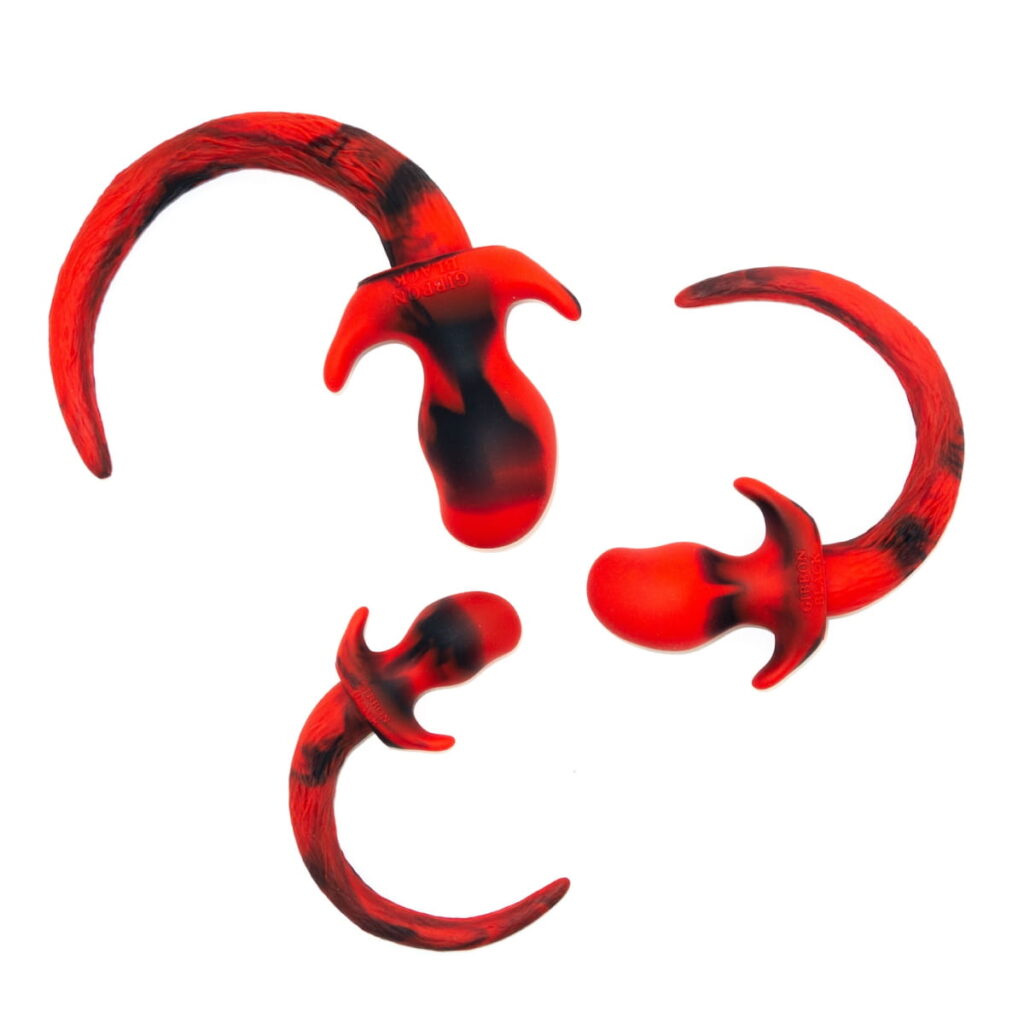 ergonomic pup tail plug in red silicone